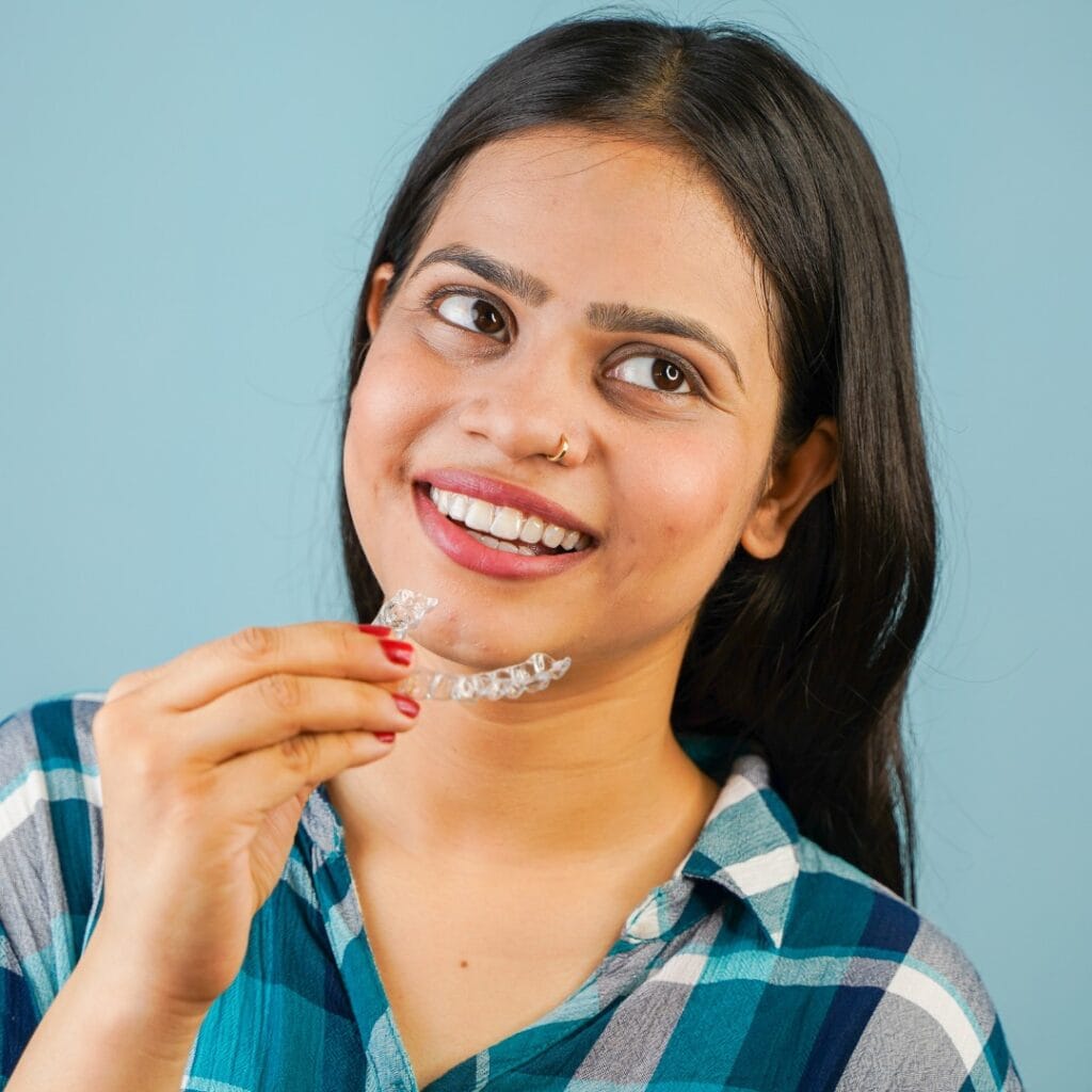 Invisalign Treatment With Dental Implants Or Crowns